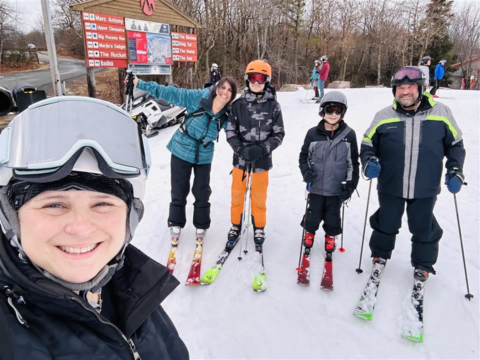 students and chaperones skiing